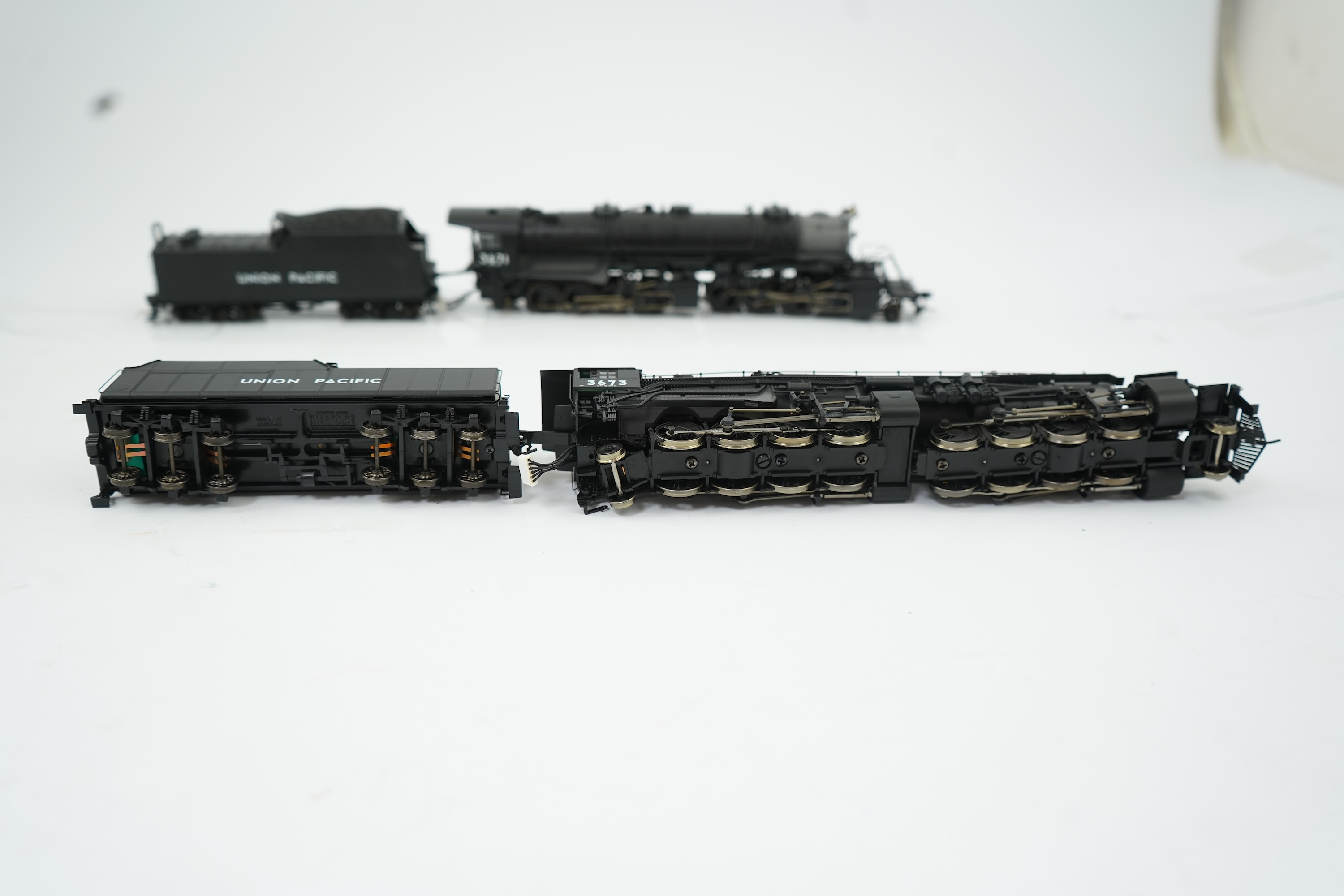 Two boxed HO gauge Proto 2000 Heritage Union Pacific locomotives; (23342) model of 3671, 2-8-8-2 tender locomotive, and (23343) model of 3673, 2-8-8-2 tender locomotive, both powered for two rail operation.